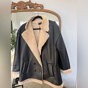 Leather and faux fur jacket